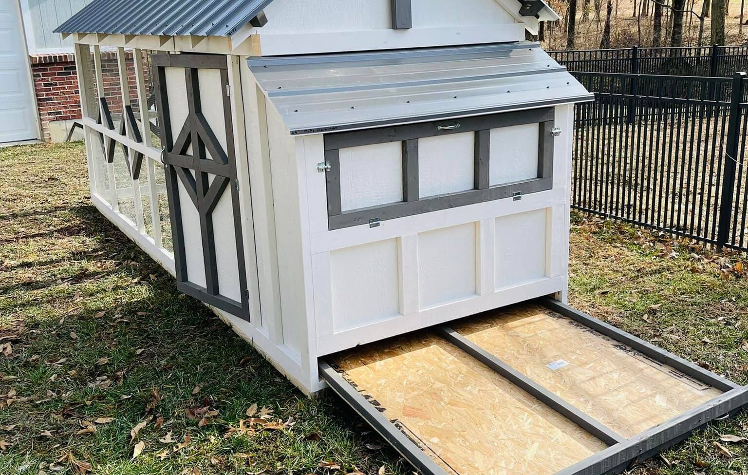 standard coop that includes a pull out drawer