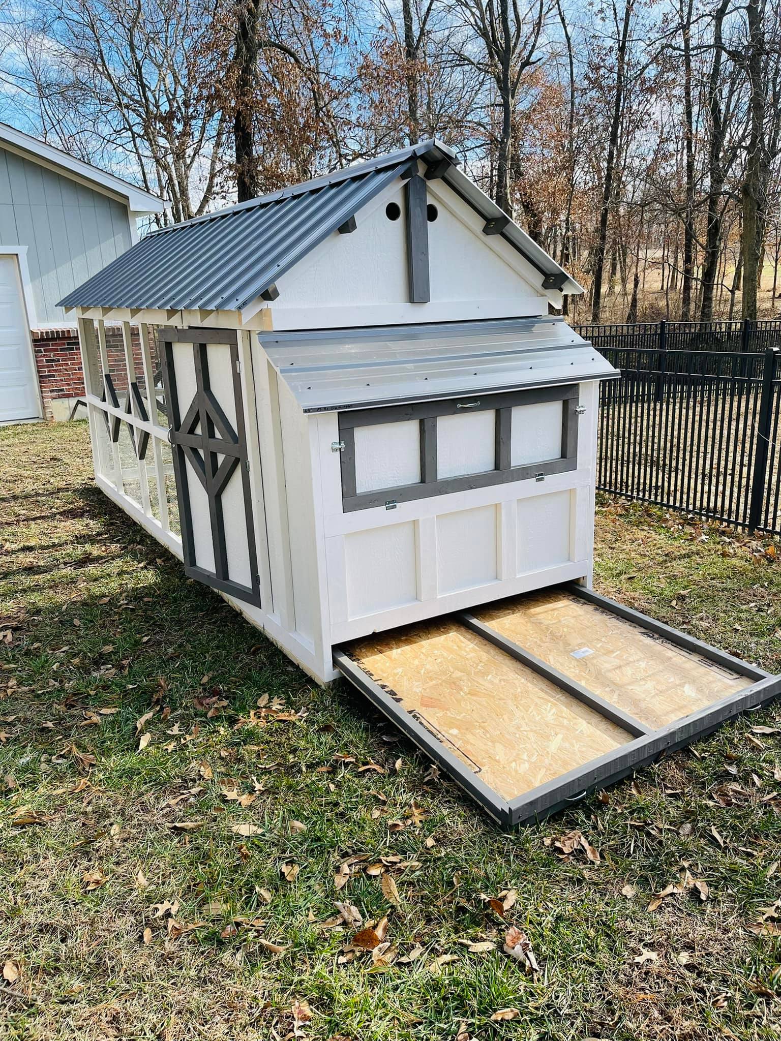 standard coop that includes a pull out drawer
